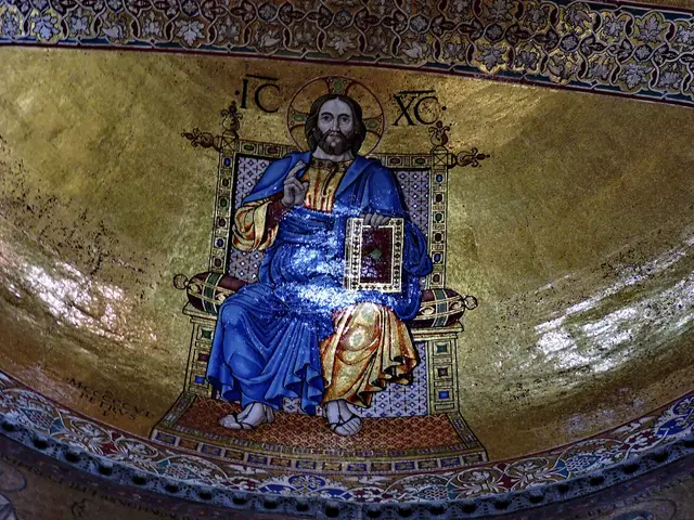 Christ enthroned holding a book, in a gold mosaic