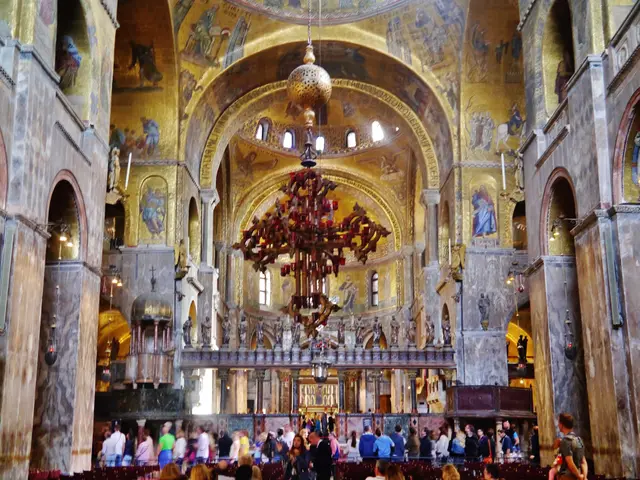The nave looking east, with a great hanging lamp before the iconostasis